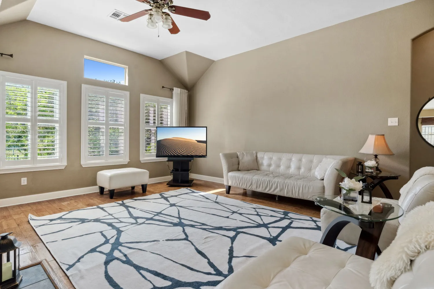 a living room with furniture and a window
