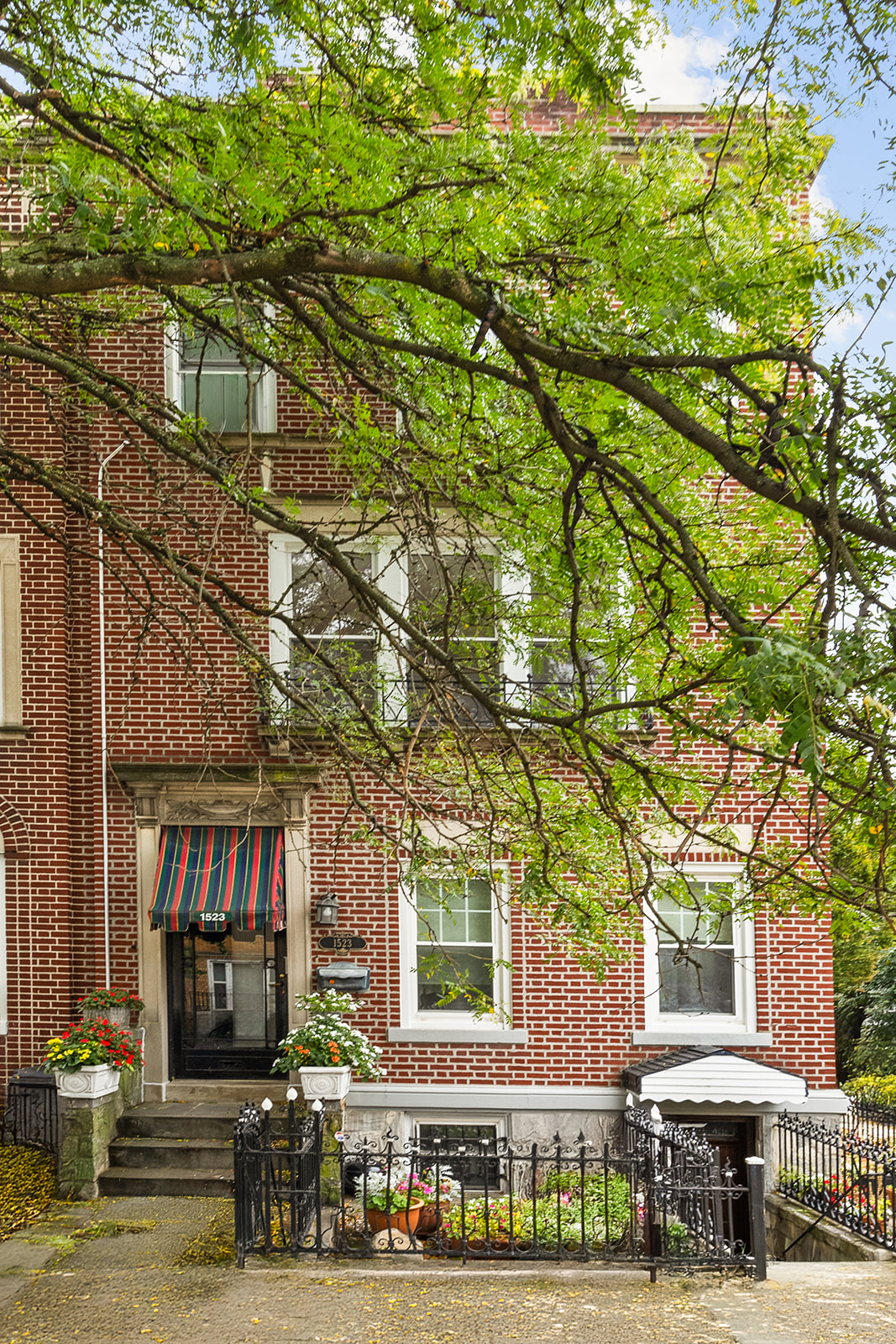 a front view of a building with street view