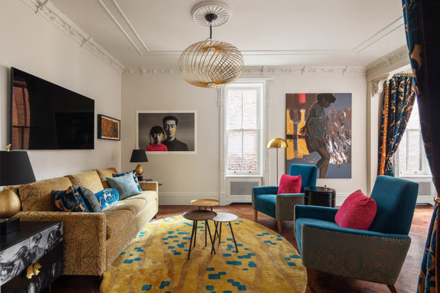 34 Gramercy Park East, Unit 8B/R Manhattan, NY 10003 - Photo 1 of 14 a living room with furniture and a flat screen tv