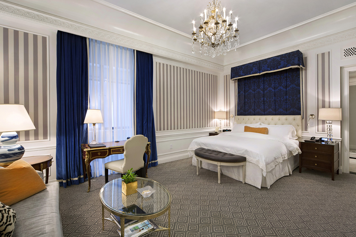 2 East 55th Street, Unit 808W38 Manhattan, NY 10022 - Photo 3 of 11 a bed room with a bed and a chair