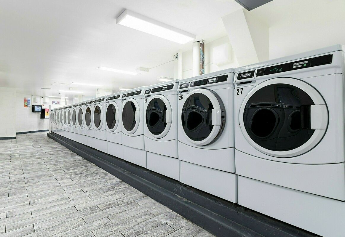 3333 Broadway, Unit D4G Manhattan, NY 10031 - Photo 9 of 21 a utility room with dryer and washer