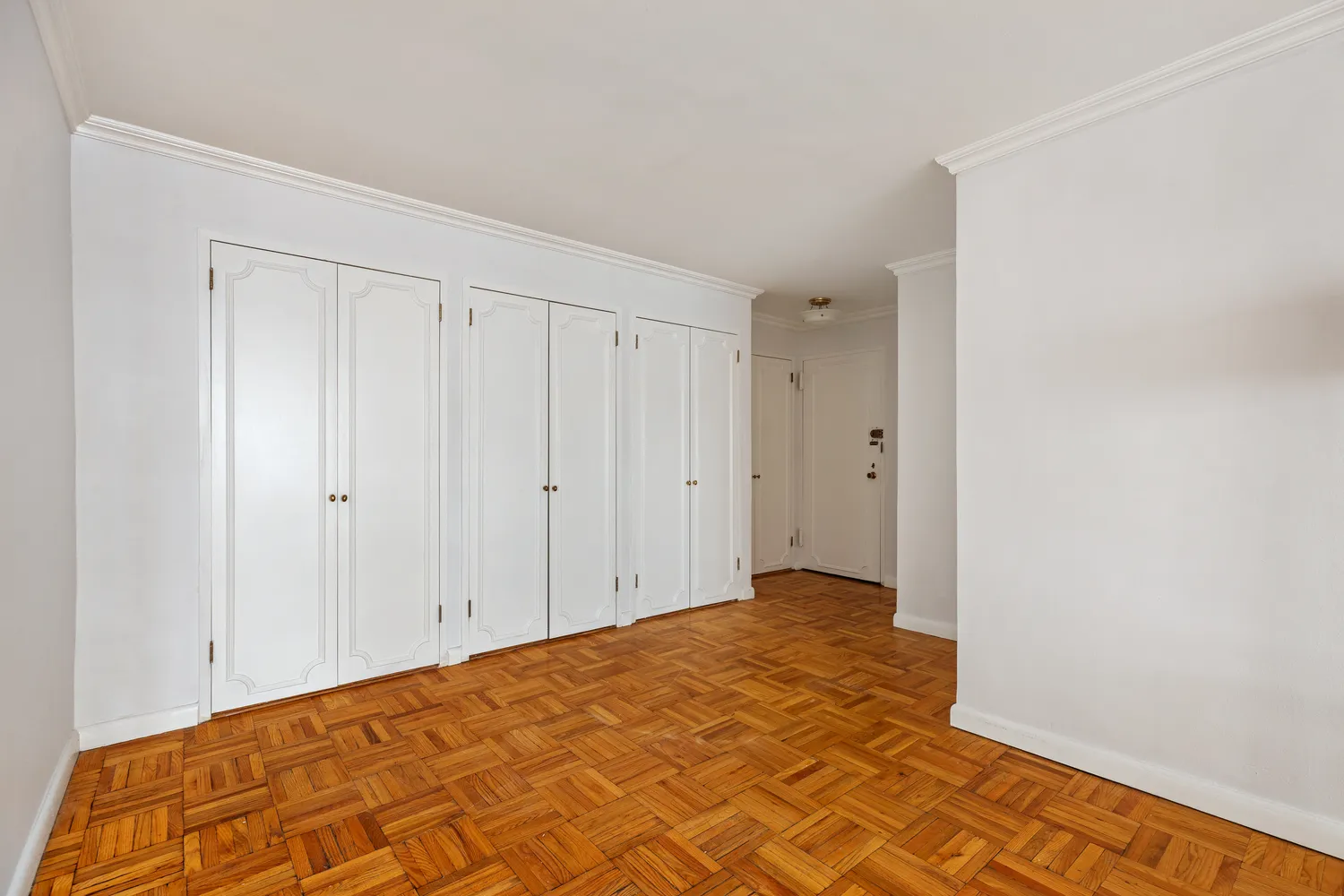 a view of a big room with wooden floor