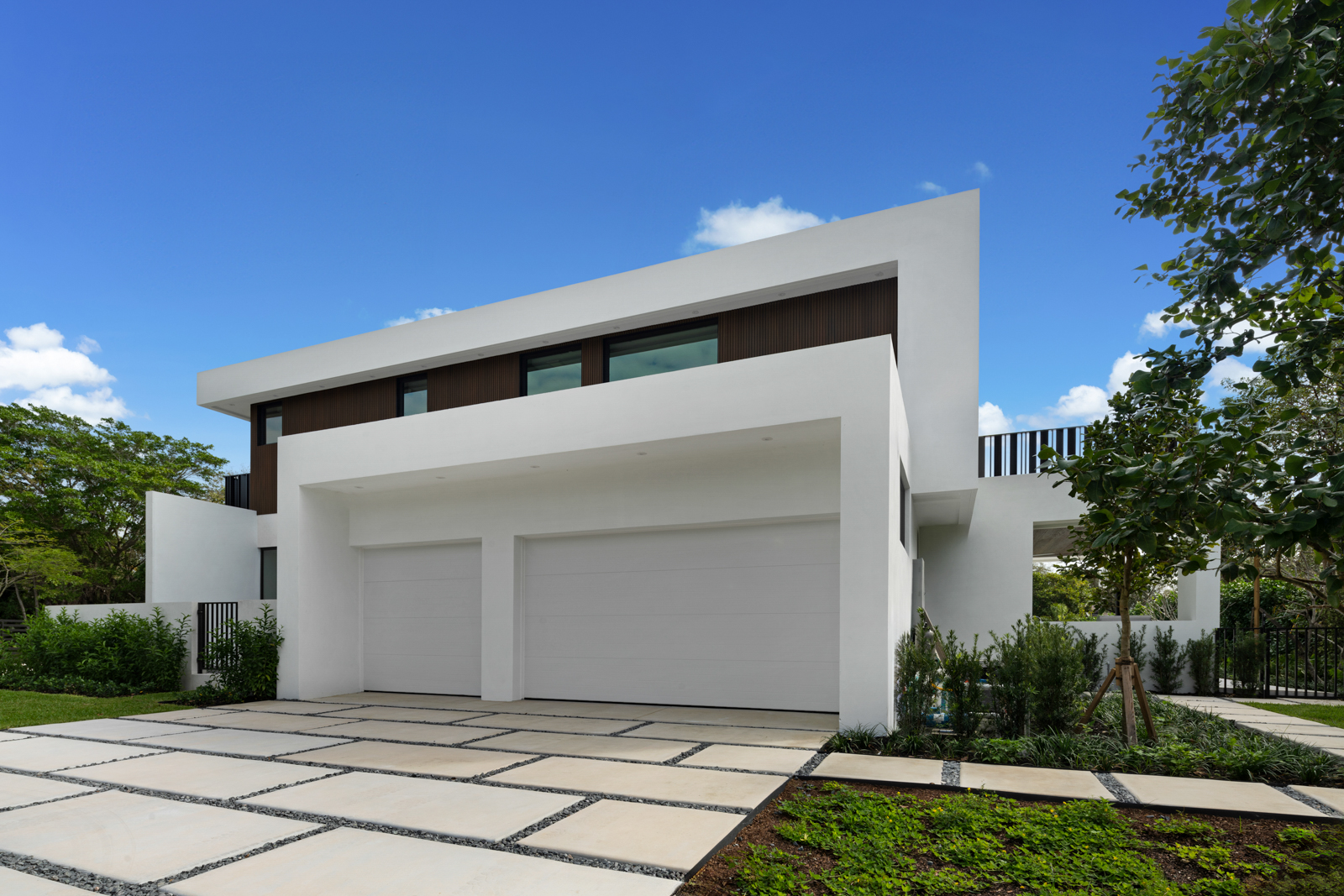 6920 Southwest 124th Street Pinecrest, FL 33156 - Photo 43 of 48 a front view of a house with garden