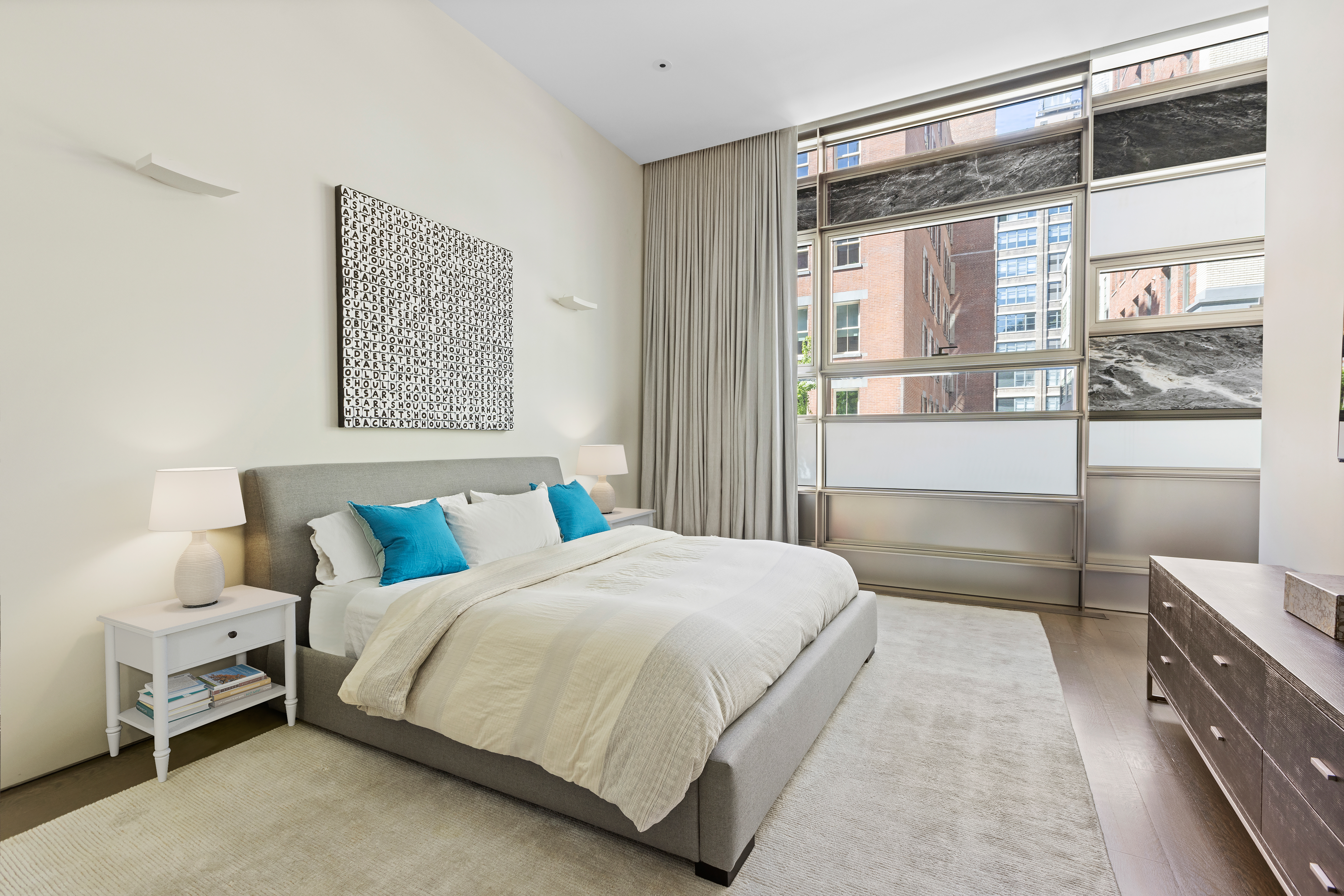33 Vestry Street, Unit TH1 Manhattan, NY 10013 - Photo 13 of 17 a bedroom with a bed wooden floor and window