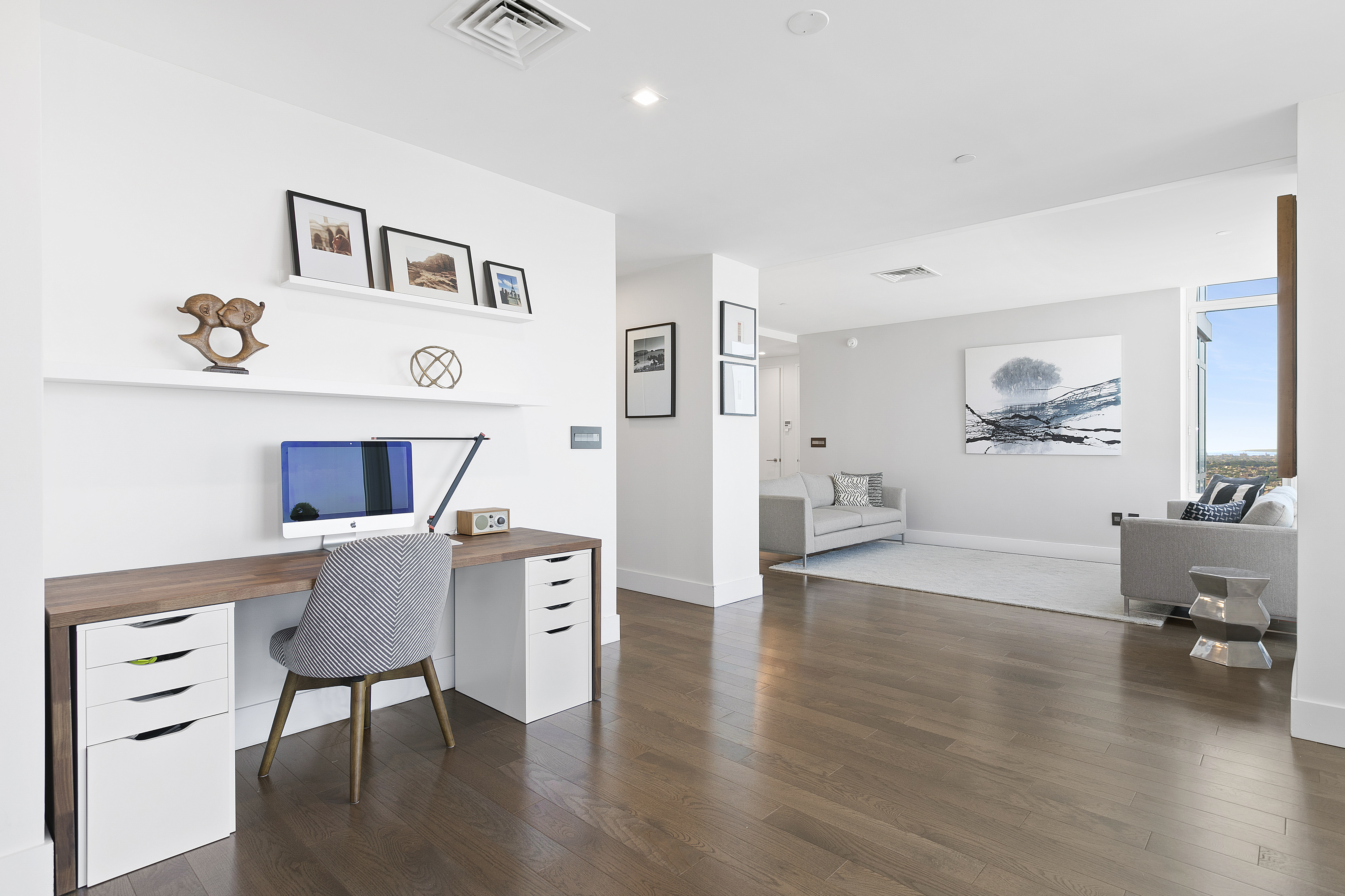 388 Bridge Street, Unit PH45AB Brooklyn, NY 11201 - Photo 9 of 36 a living room with furniture and wooden floor