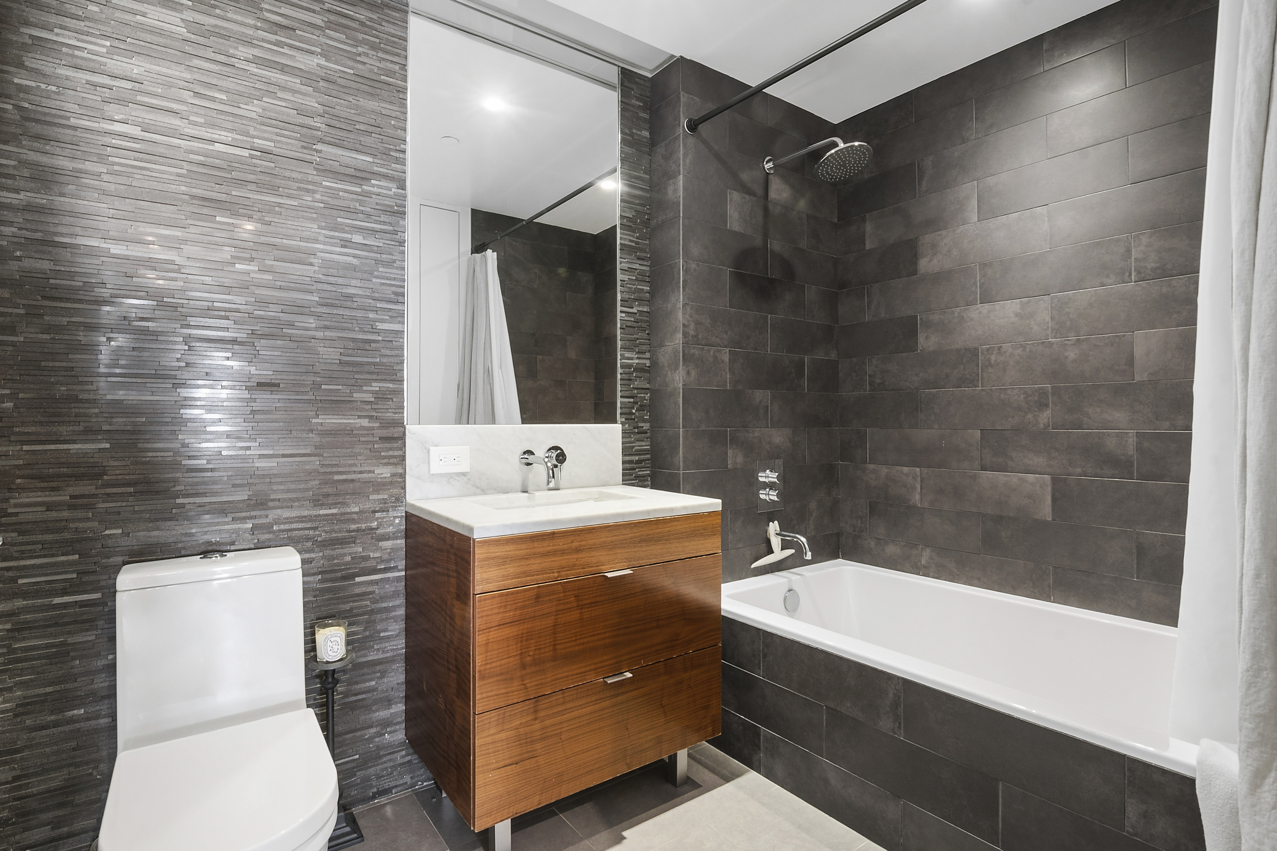 205 Water Street, Unit 2E Brooklyn, NY 11201 - Photo 6 of 12 a bathroom with a sink toilet and shower