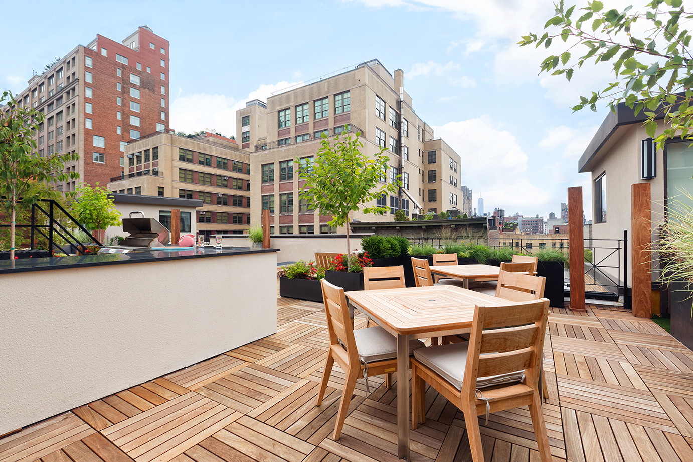 245 West 25th Street, Unit 5H Manhattan, NY 10001 - Photo 10 of 13 a view of a patio with a table and chairs