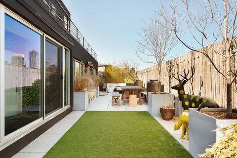 a view of yard with patio