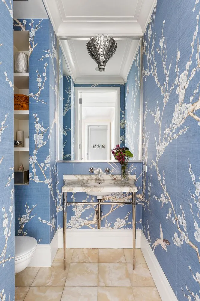 a bathroom with a sink a mirror and a shower