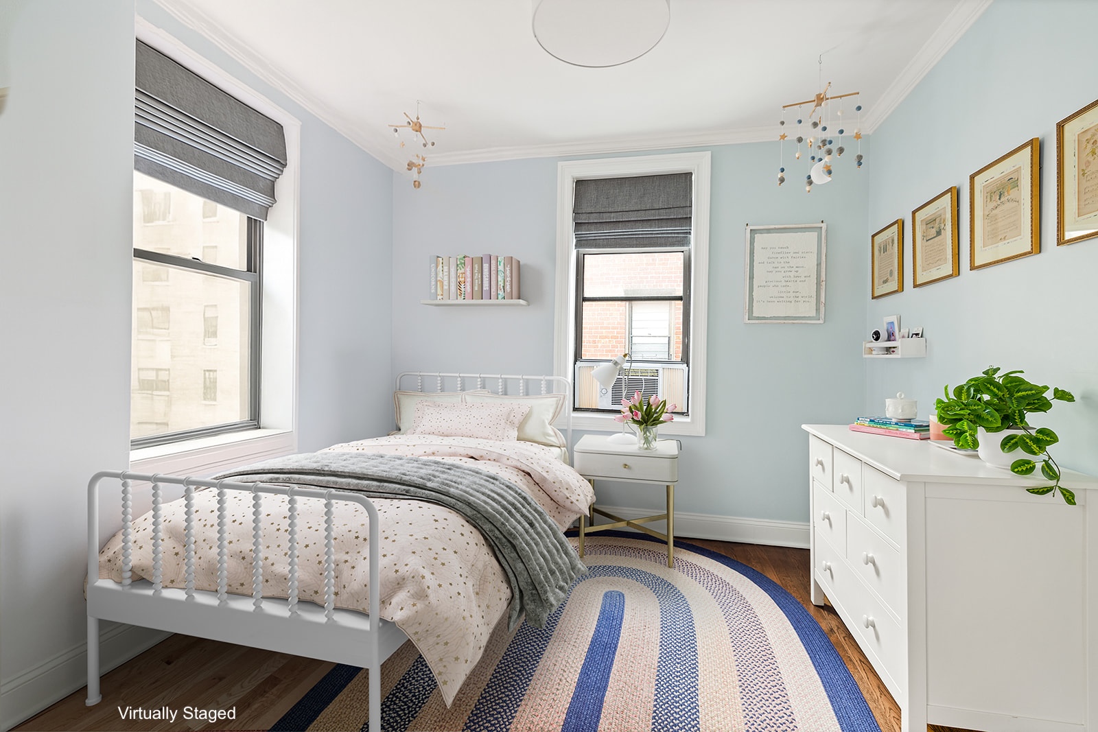30 East 9th Street, Unit 5M Manhattan, NY 10003 - Photo 7 of 10 a bedroom with a bed and a window