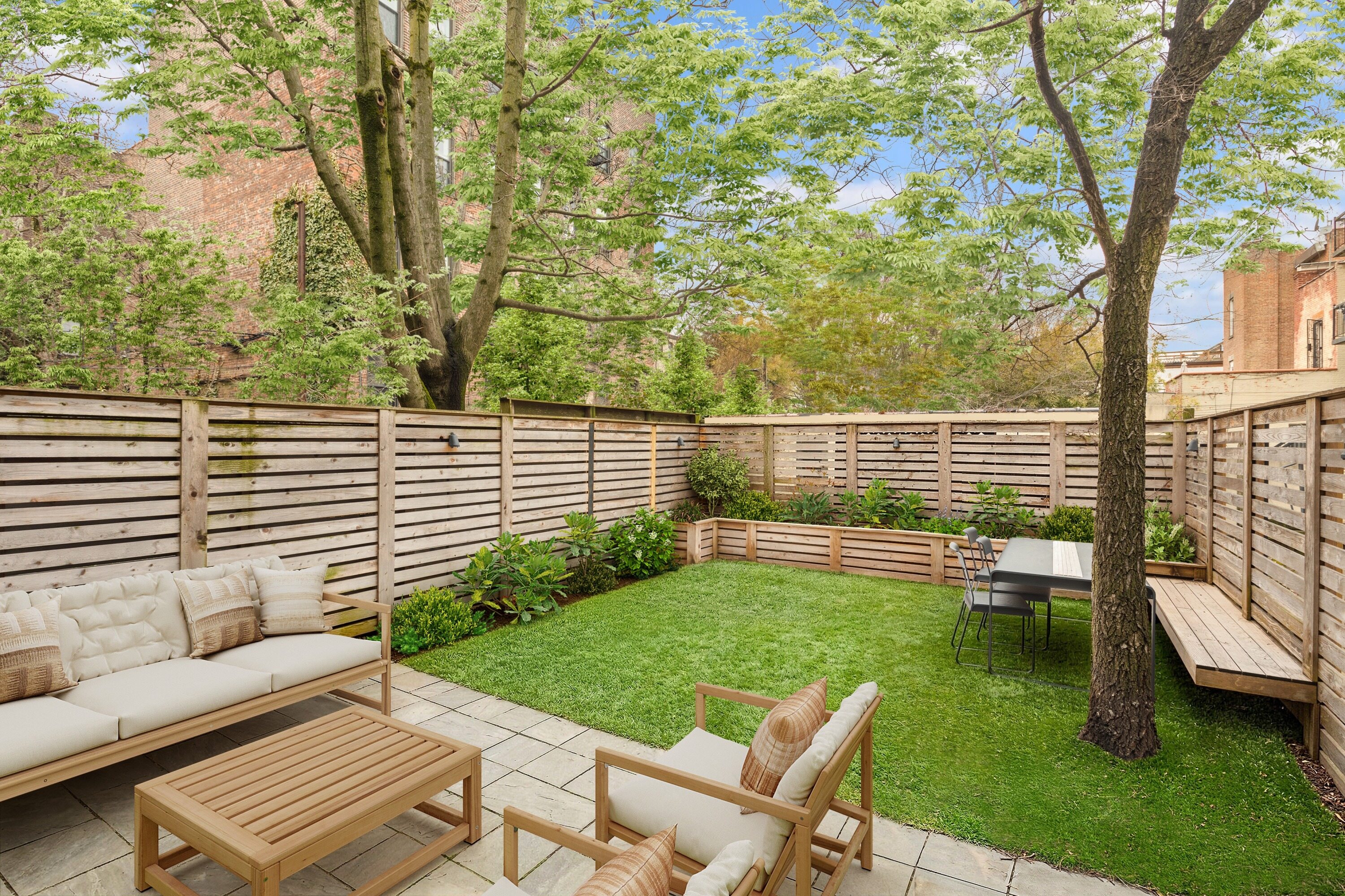 152 Underhill Avenue Brooklyn, NY 11238 - Photo 1 of 20 a view of a patio with a yard