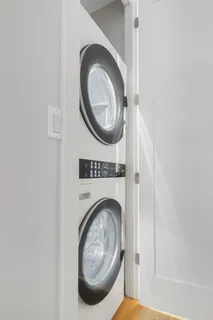 a view of washer and dryer in a utility room