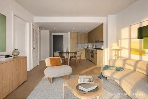 a living room with kitchen island furniture and a wooden floor