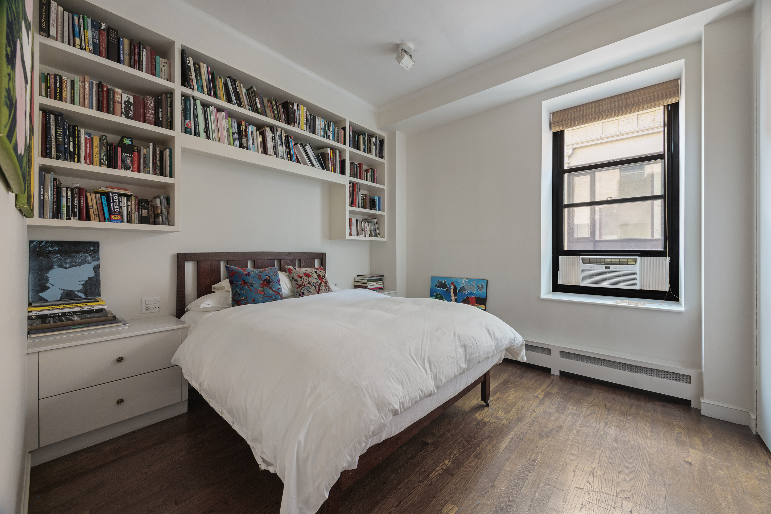 260 West Broadway, Unit 10D Manhattan, NY 10013 - Photo 9 of 20 a bedroom with a bed and a window