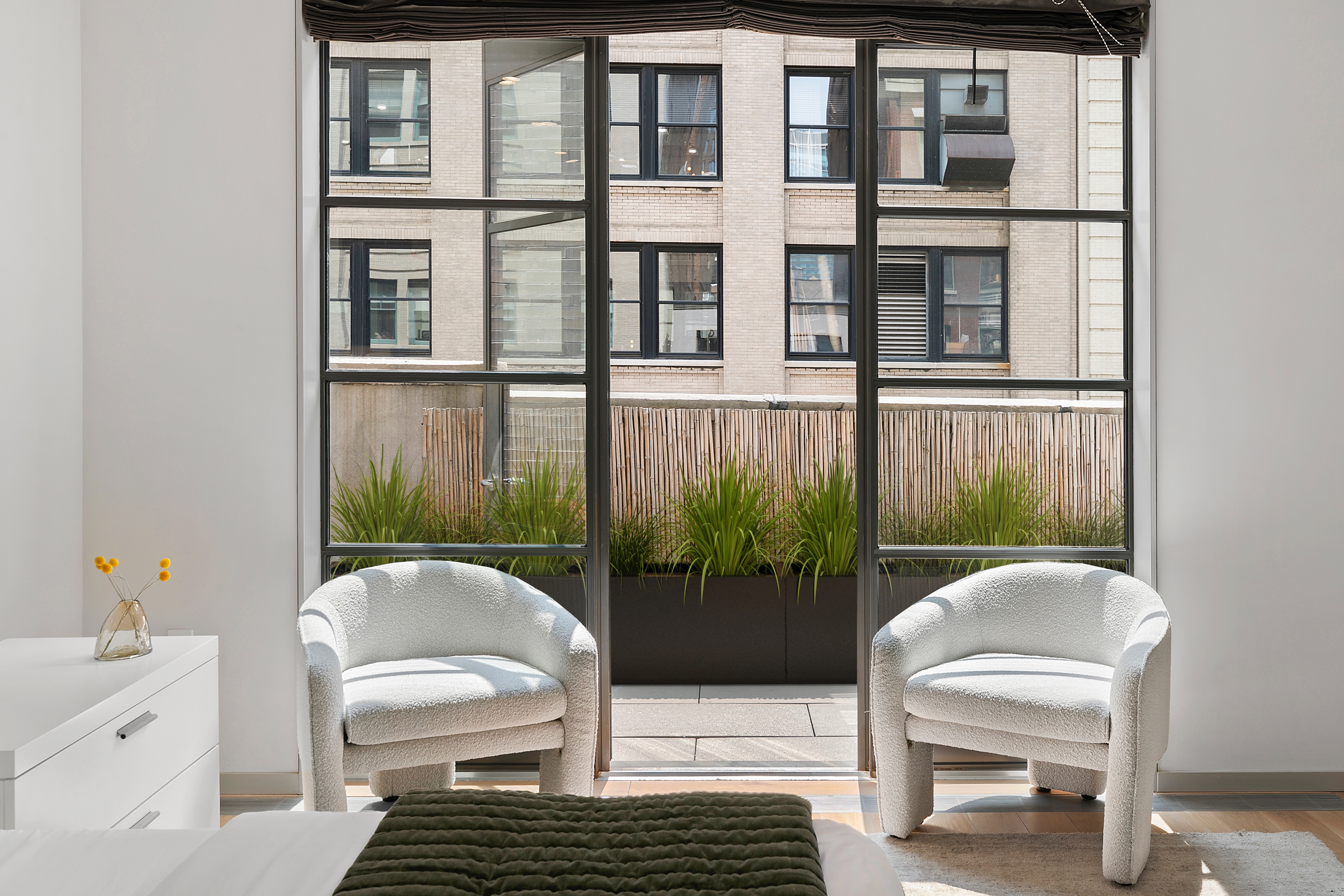 29 West 21st Street, Unit PH Manhattan, NY 10010 - Photo 6 of 17 a balcony view with a couch and table chair