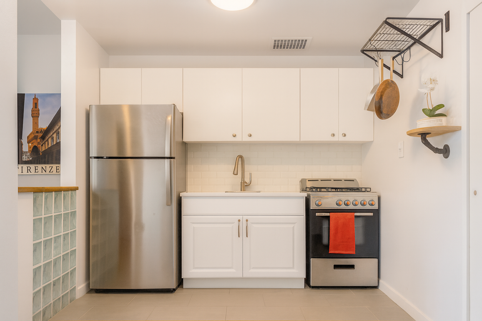 332 West 101st Street, Unit 5F Manhattan, NY 10025 - Photo 3 of 8 a kitchen with a refrigerator and a stove