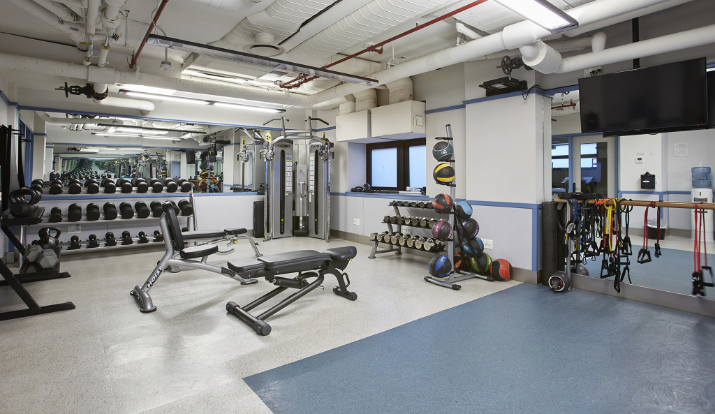 141 East 88th Street, Unit 7A Manhattan, NY 10128 - Photo 11 of 16 a view of a room with gym equipment