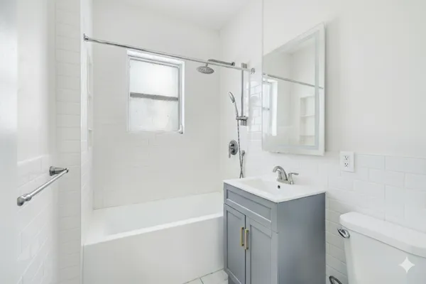 a view of hallway with wooden floor