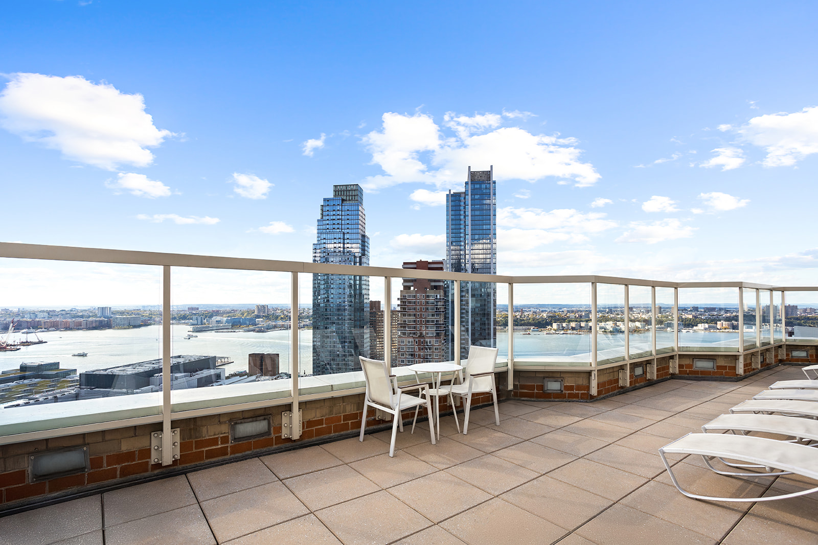 500 West 43rd Street, Unit 3B Manhattan, NY 10036 - Photo 16 of 19 a view of a city from a dining room