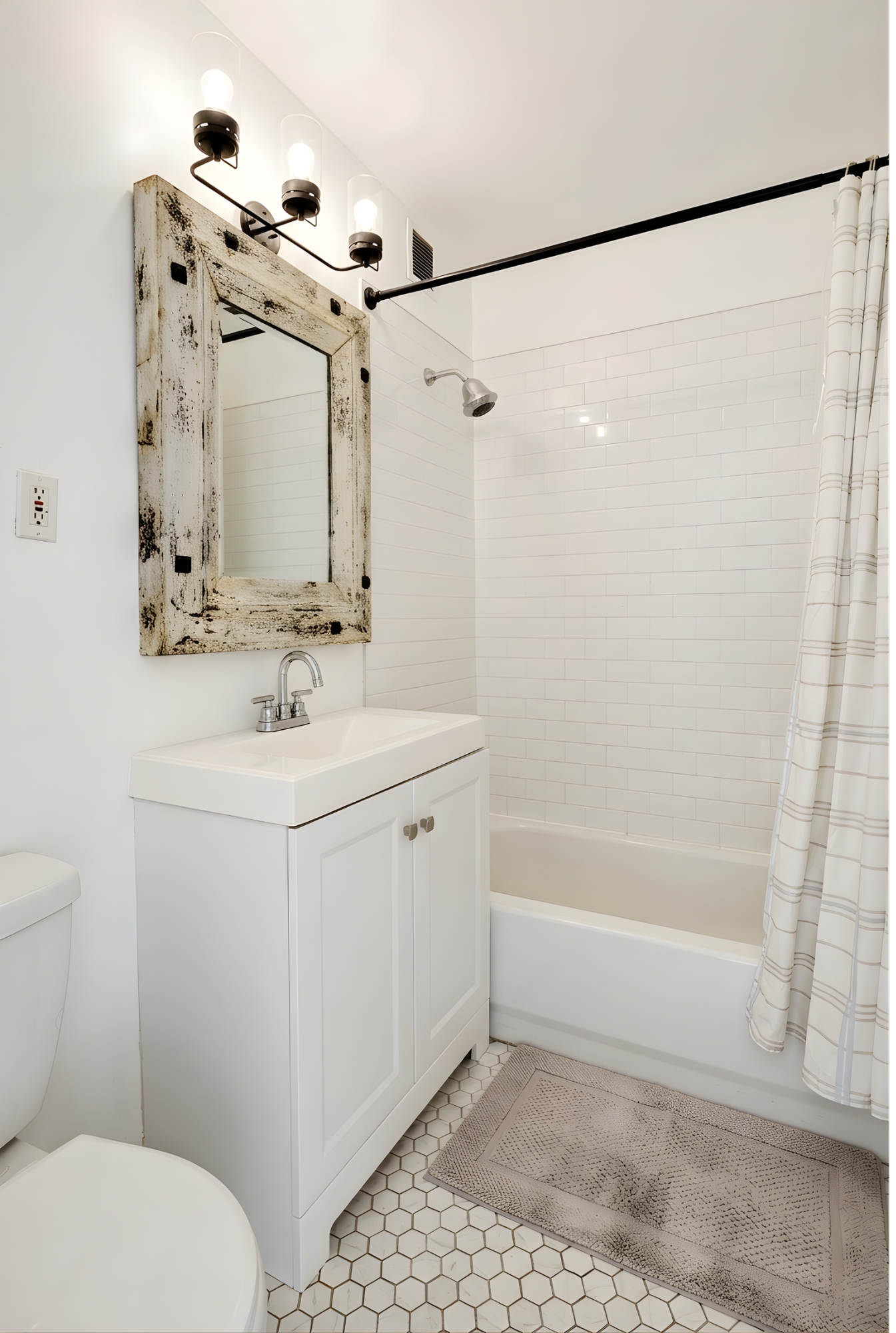 109 Pulaski Street Brooklyn, NY 11206 - Photo 9 of 14 a bathroom with a sink a toilet and shower
