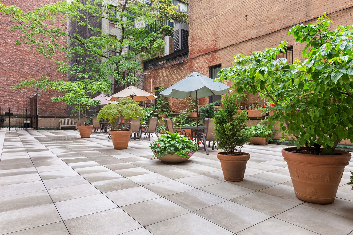 310 Lexington Avenue, Unit 9F Manhattan, NY 10016 - Photo 9 of 12 a view of a balcony with potted plants