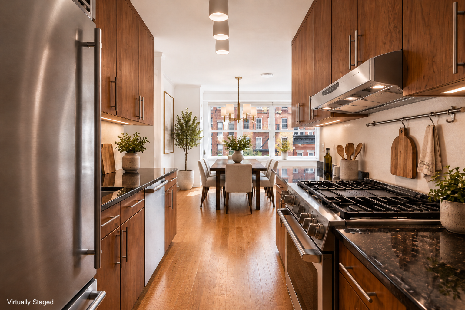 420 East 72nd Street, Unit 7L Manhattan, NY 10021 - Photo 3 of 10 a kitchen with stainless steel appliances granite countertop a stove a sink dishwasher and cabinets with wooden floor