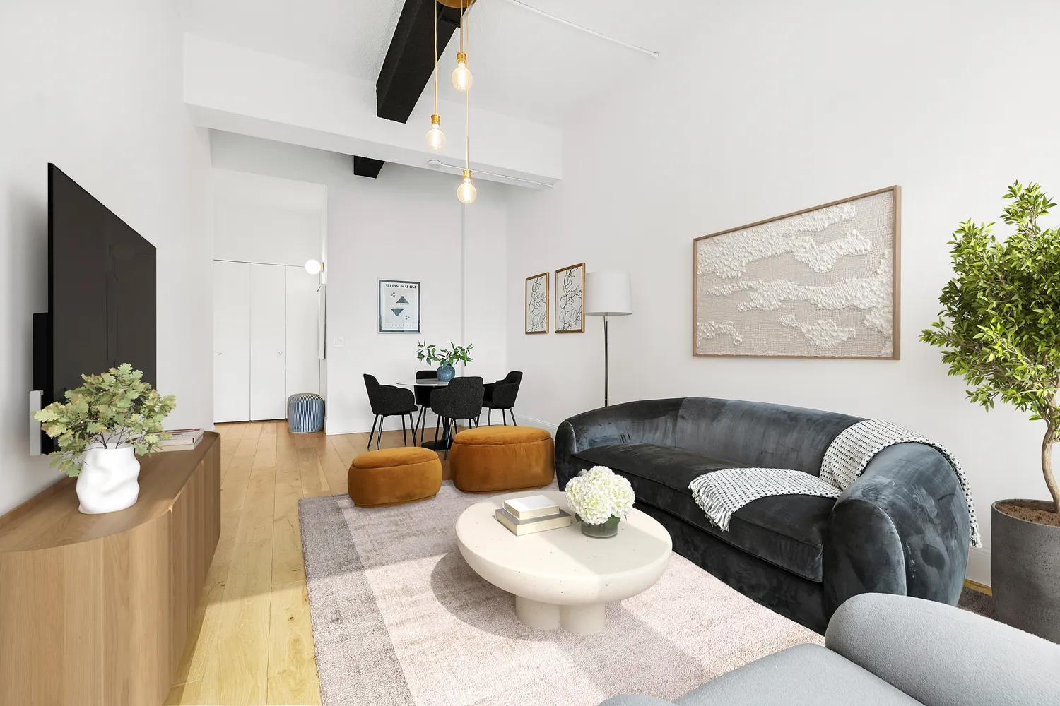 a living room with furniture and flowers