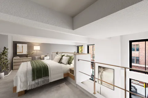 a bathroom with a sink toilet vanity and shower