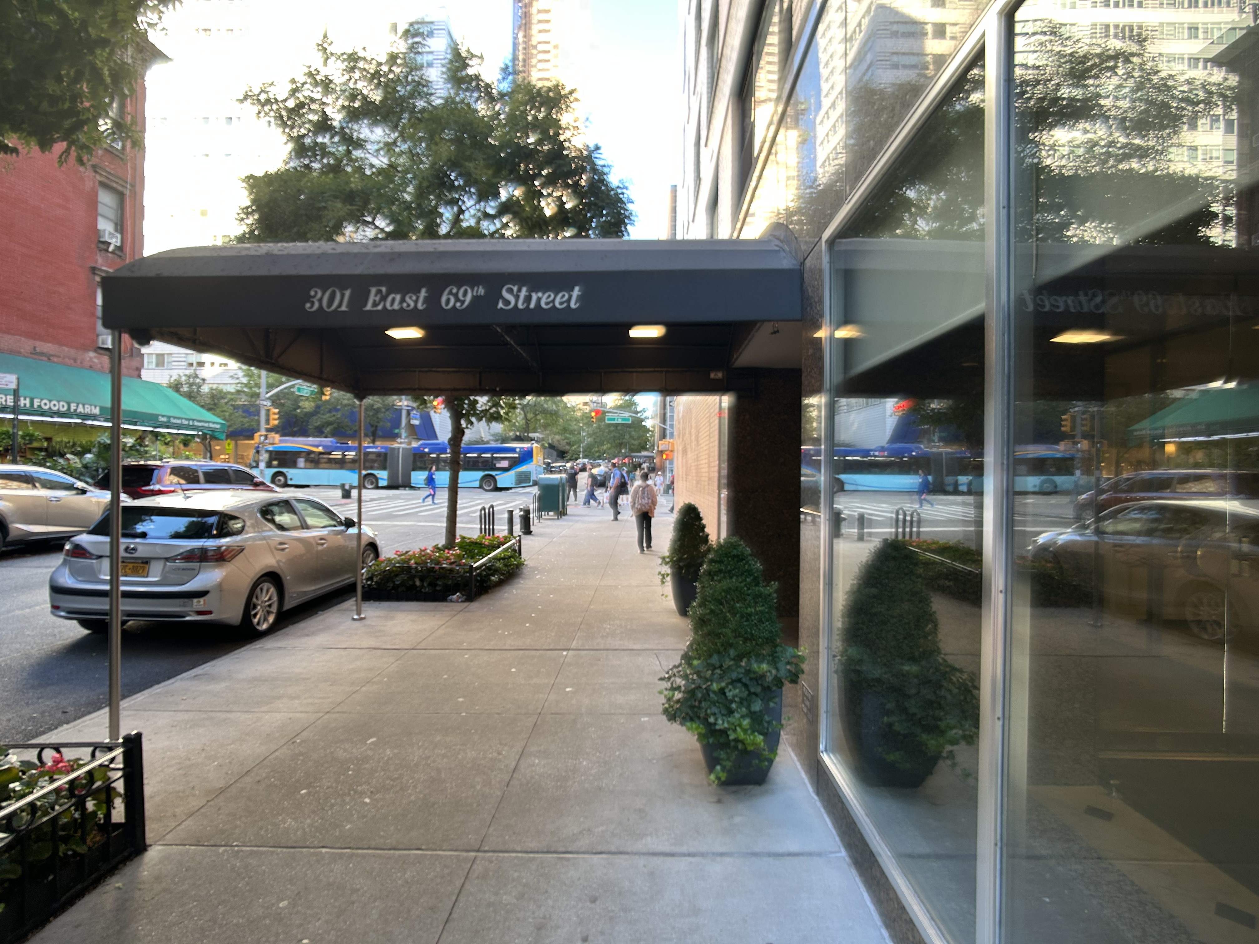 301 East 69th Street, Unit 14A Manhattan, NY 10021 - Photo 10 of 13 a view of a cars park in front of a building