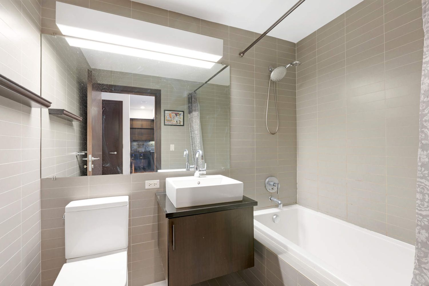 150 Myrtle Avenue, Unit 1005 Brooklyn, NY 11201 - Photo 4 of 21 a bathroom with a sink a toilet and shower
