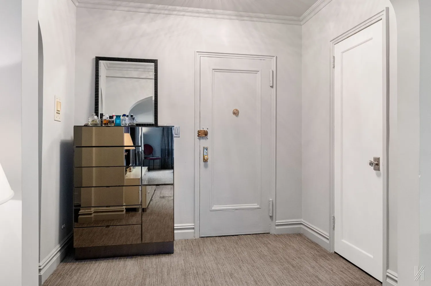 a area with wooden floor and closet