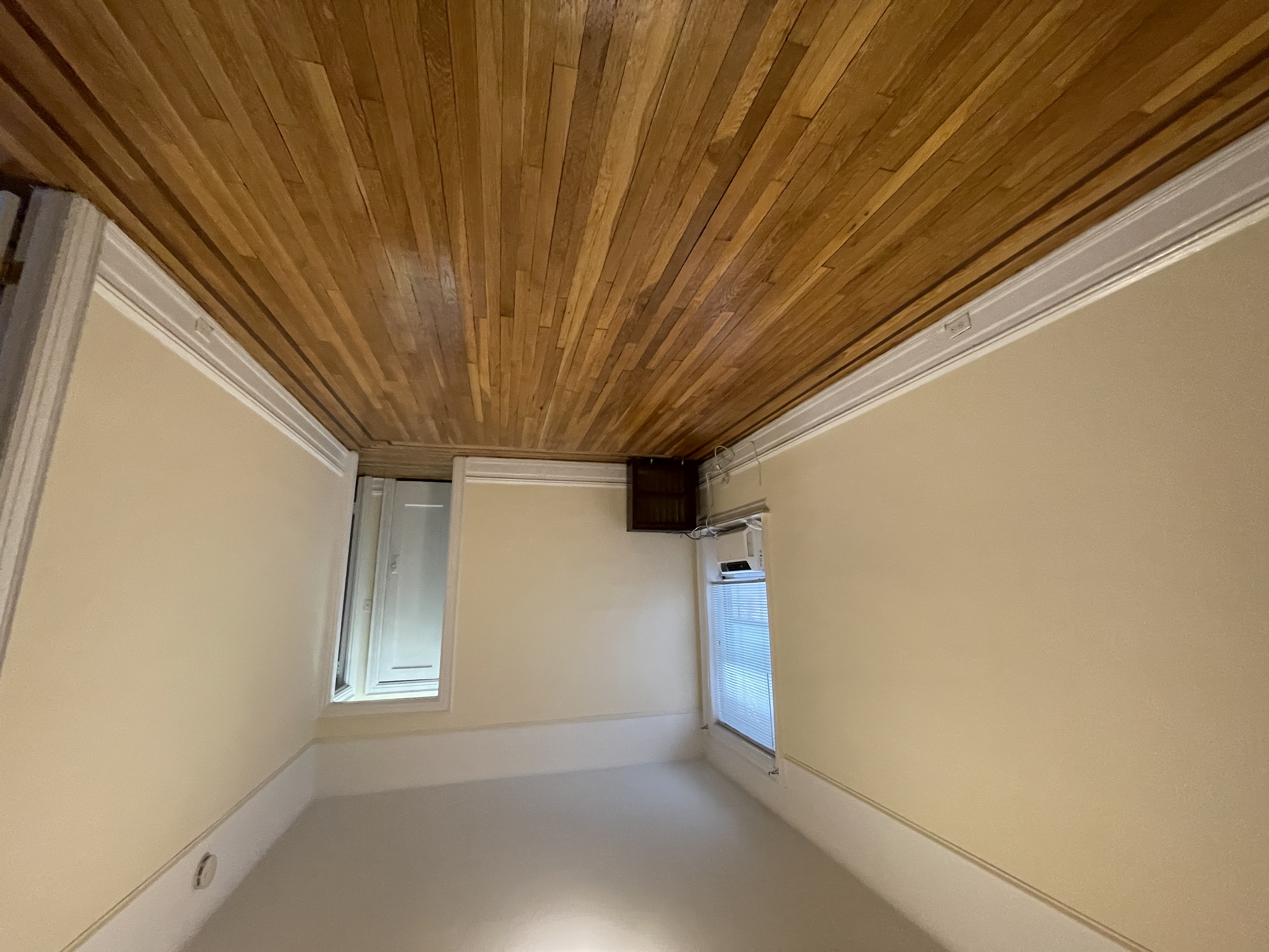 31-74 33rd Street Queens, NY 11106 - Photo 6 of 16 a view of wooden floor in a room