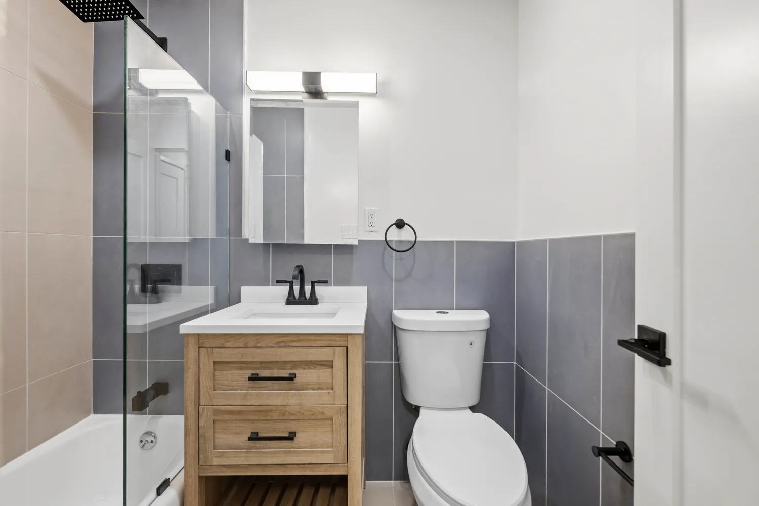 a view of a lobby with black carpet