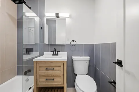 a view of a lobby with black carpet