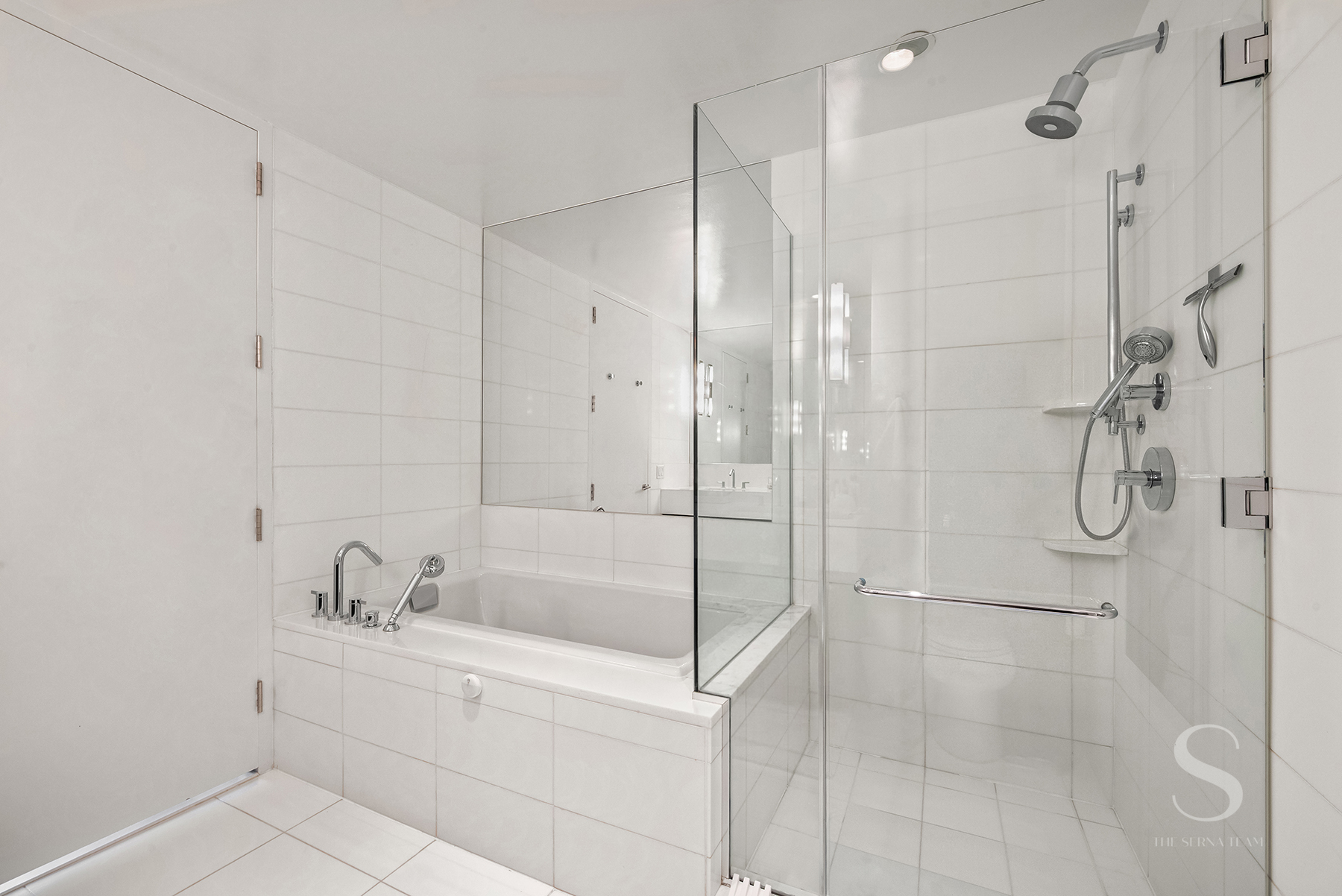 4 West 21st Street, Unit 14A Manhattan, NY 10010 - Photo 8 of 16 a bathroom with a bathtub and a shower
