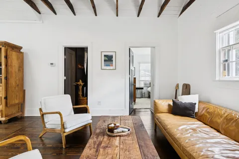 a living room with furniture and a couch