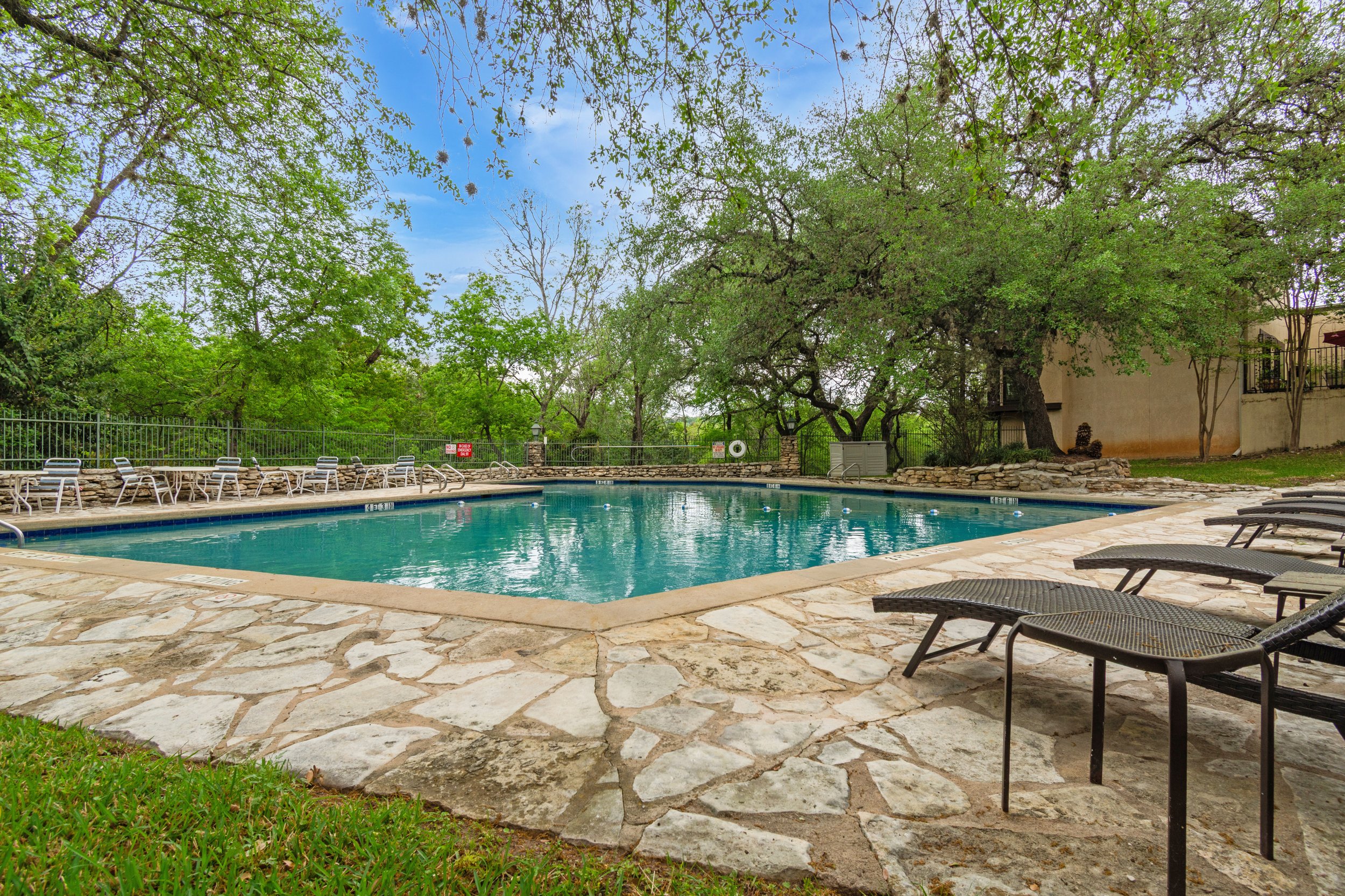 3601 Las Colinas Drive, Unit C Austin, TX 78731 - Photo 26 of 33 a view of lake with table and chairs