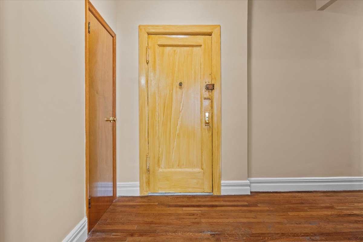 7101 Colonial Road, Unit R3E Brooklyn, NY 11209 - Photo 7 of 19 a view of a bathroom with wooden floor