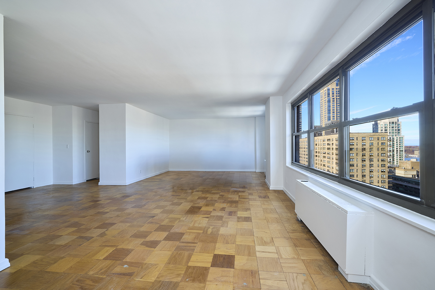 180 West End Avenue, Unit 27A Manhattan, NY 10023 - Photo 6 of 18 a view of an empty room and window