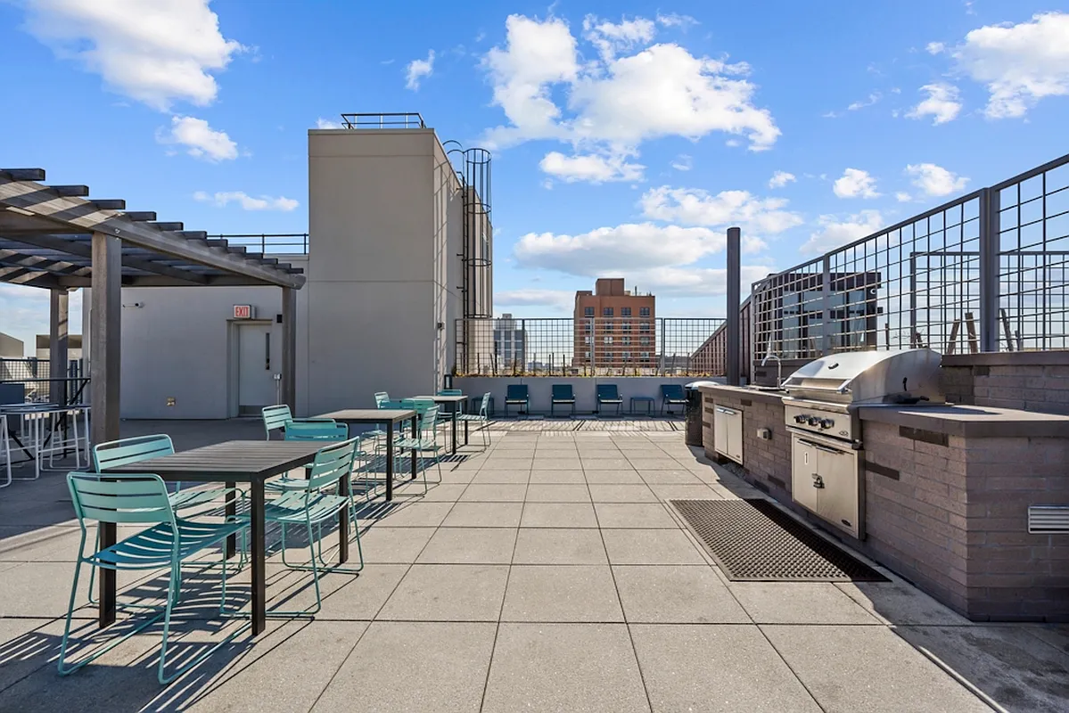 350 Clarkson Avenue, Unit 723 Brooklyn, NY 11226 - Photo 20 of 24 a view of a terrace with furniture and stove
