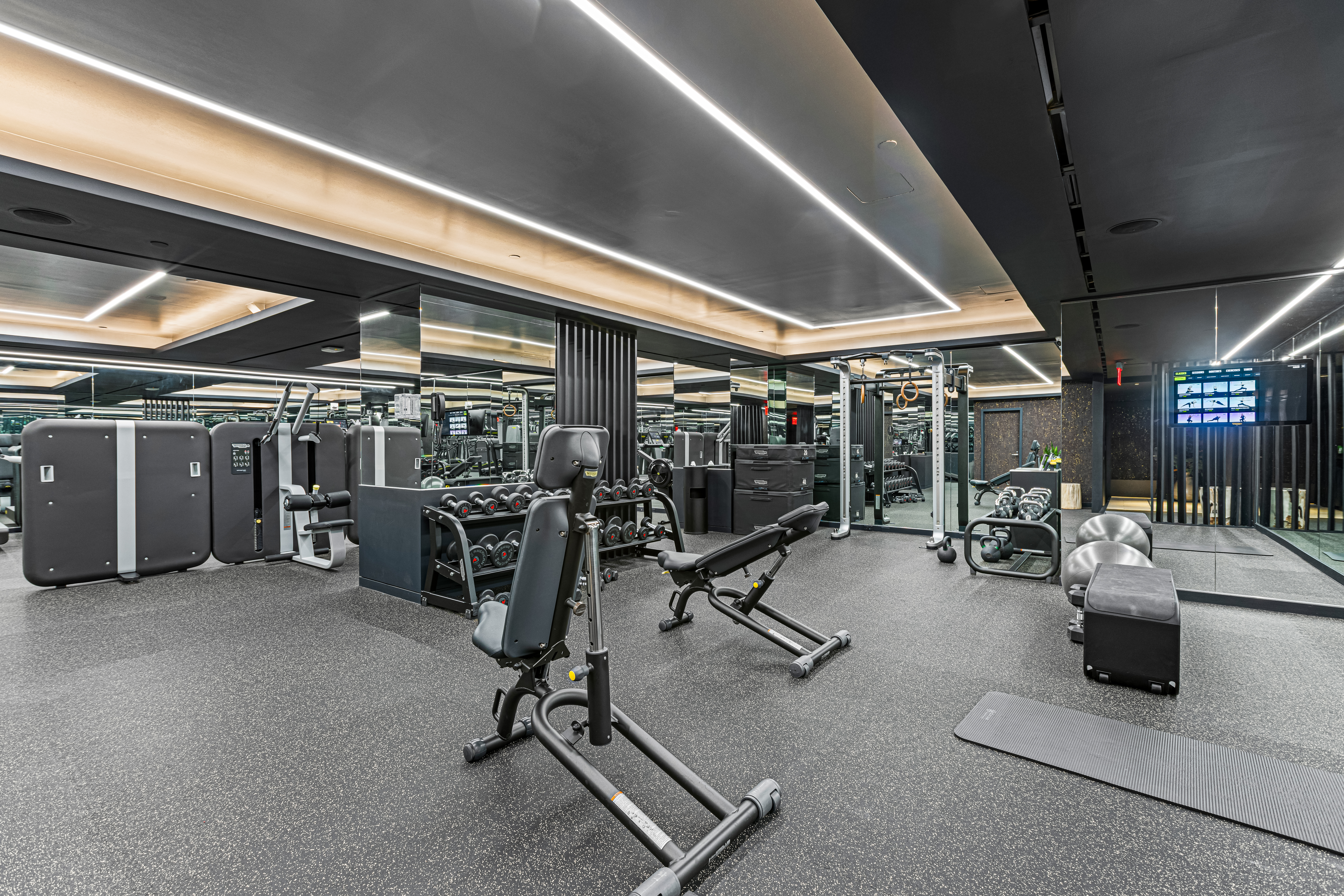 400 5th Avenue, Unit 49C Manhattan, NY 10018 - Photo 19 of 21 a view of a room with gym equipment
