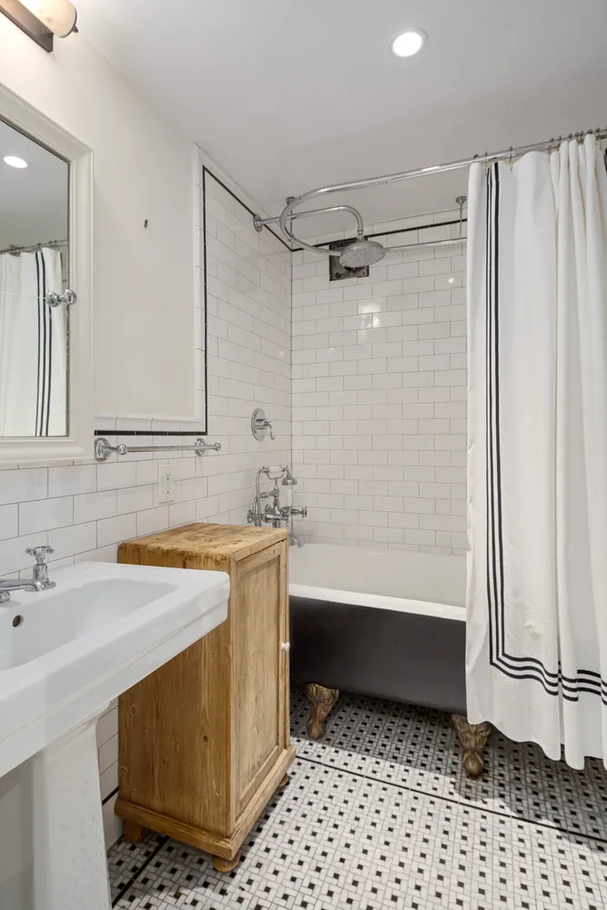 a bathroom with a sink a toilet and a bathtub