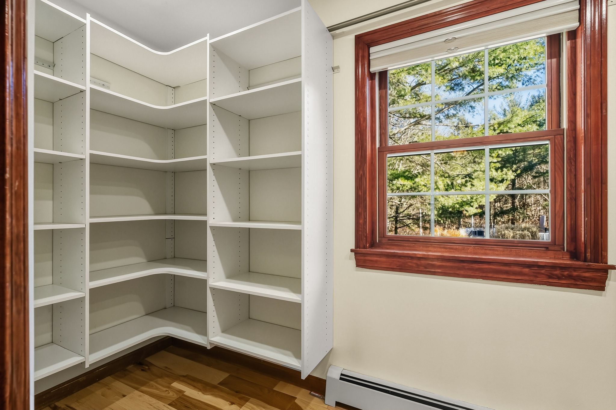 129 H J Albee Drive Braintree, MA 02184 - Photo 15 of 36 a view of a room with rack on the wall and a window