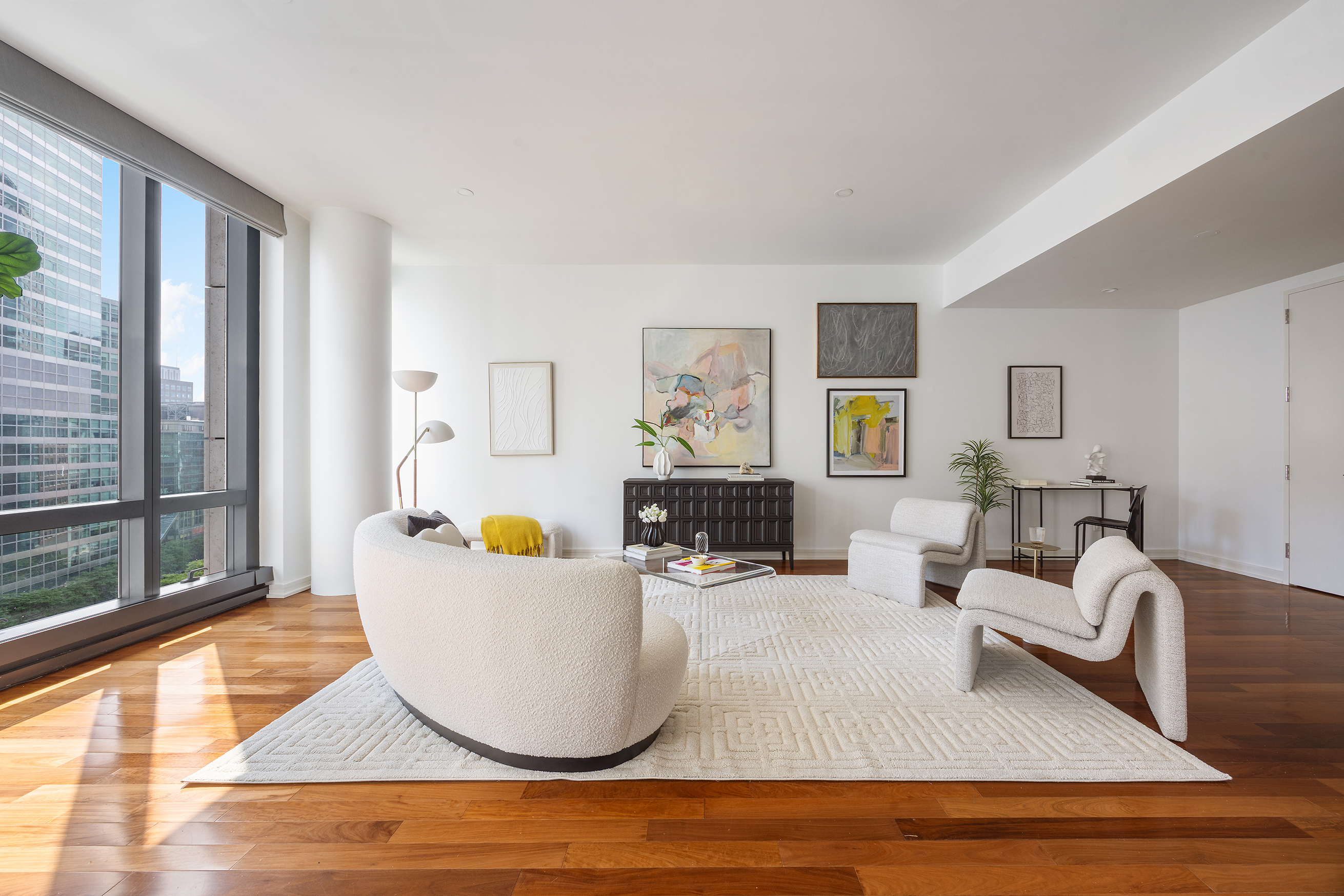 101 Warren Street, Unit 12L Manhattan, NY 10007 - Photo 6 of 28 a living room with furniture and window