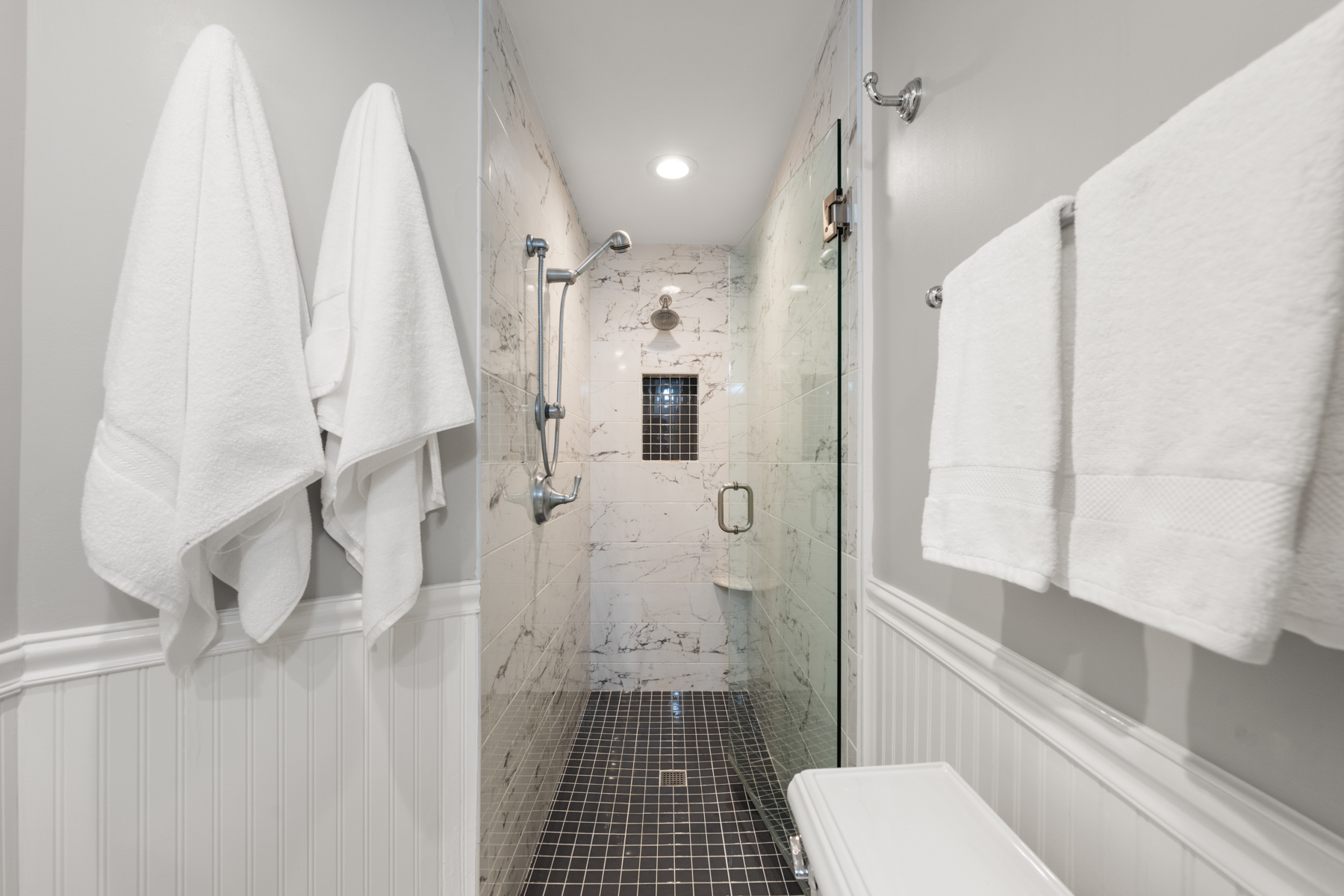 63 West Cedar Street, Unit 3 Boston, MA 02114 - Photo 12 of 17 a bathroom with a shower and a toilet