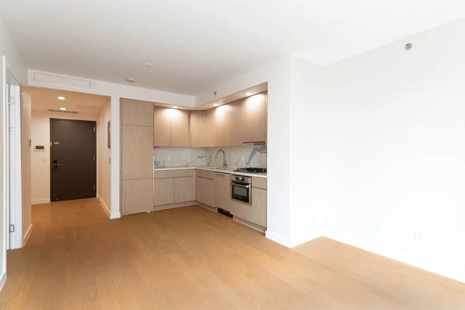 a view of a kitchen with a sink