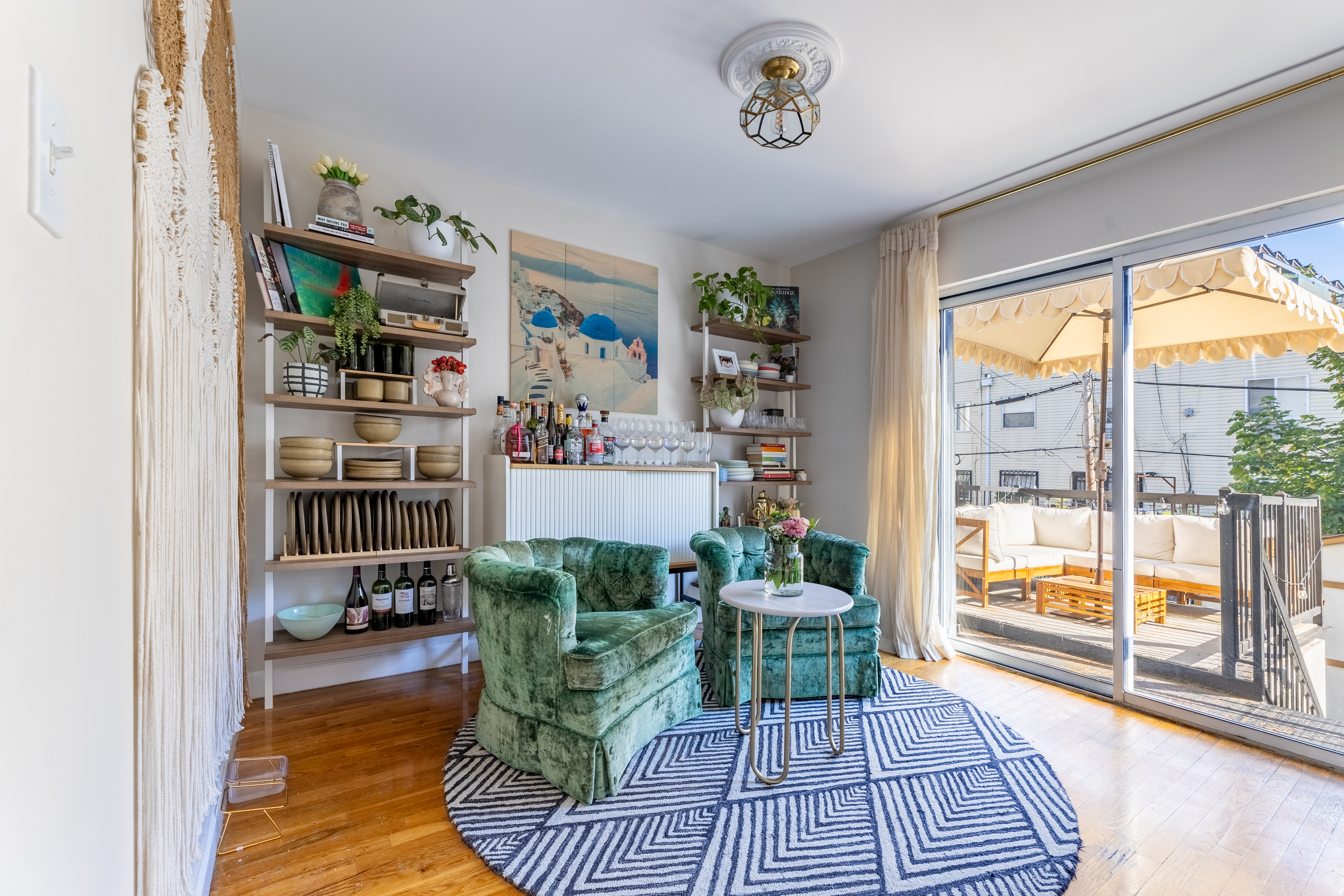 80 South 3rd Street, Unit 2 Brooklyn, NY 11249 - Photo 4 of 15 a living room with furniture and a floor to ceiling window