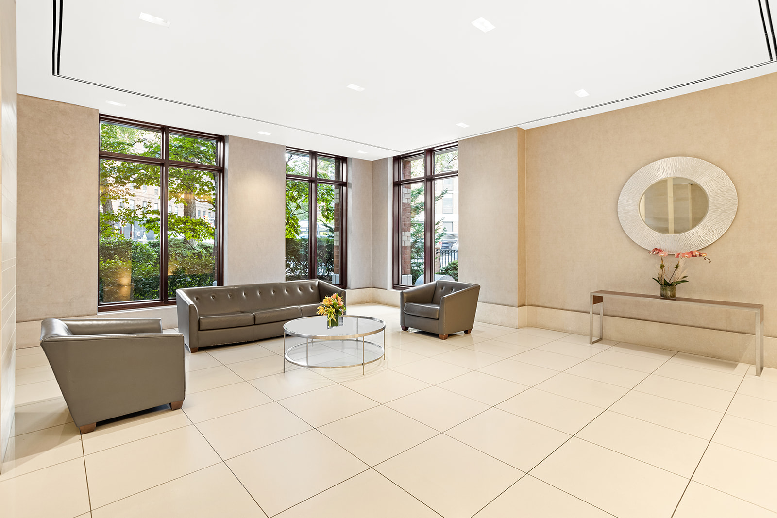 500 West 43rd Street, Unit 3B Manhattan, NY 10036 - Photo 13 of 19 a living room with furniture and a large window