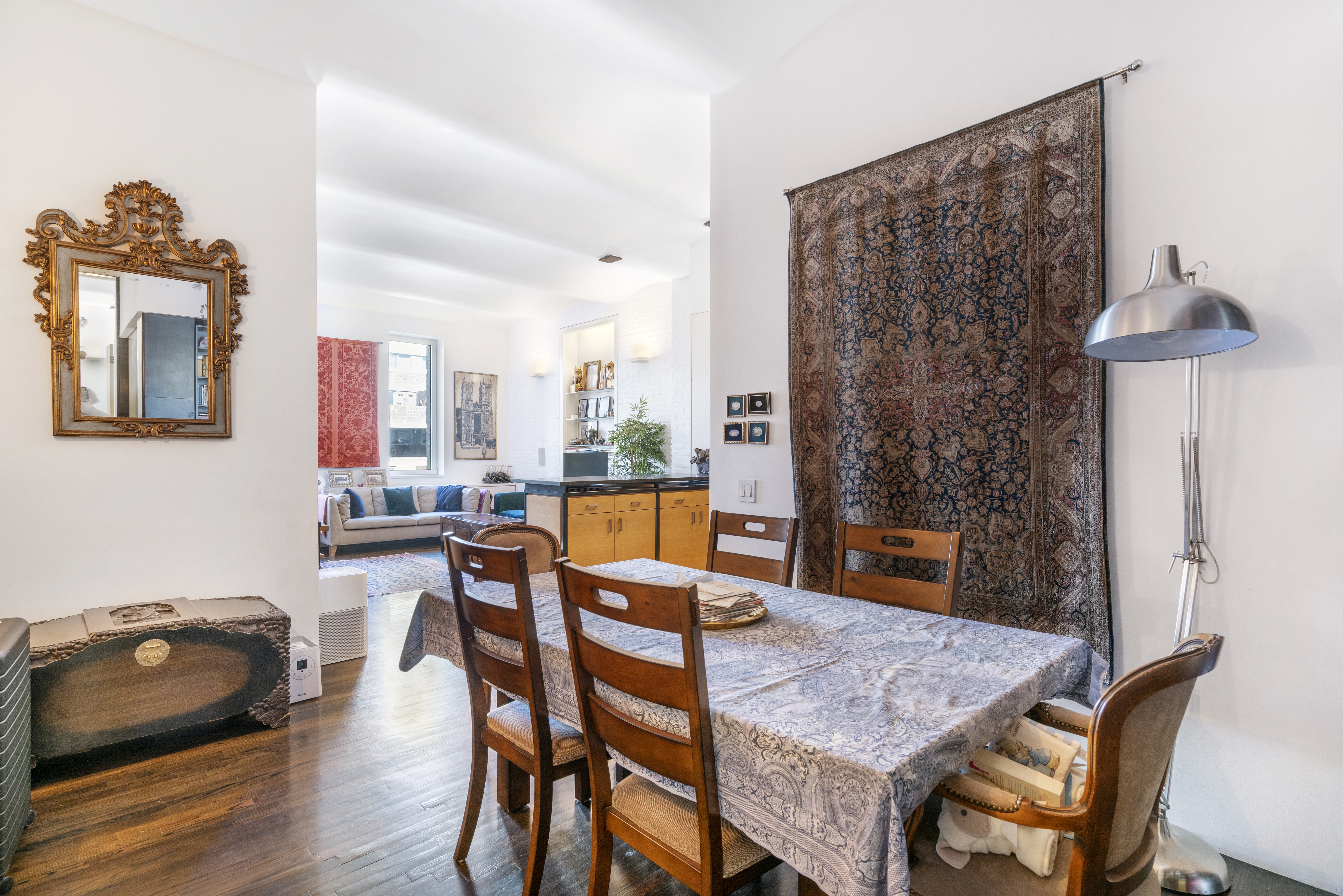 312 East 23rd Street, Unit 7B Manhattan, NY 10010 - Photo 5 of 14 a dining room with furniture and wooden floor