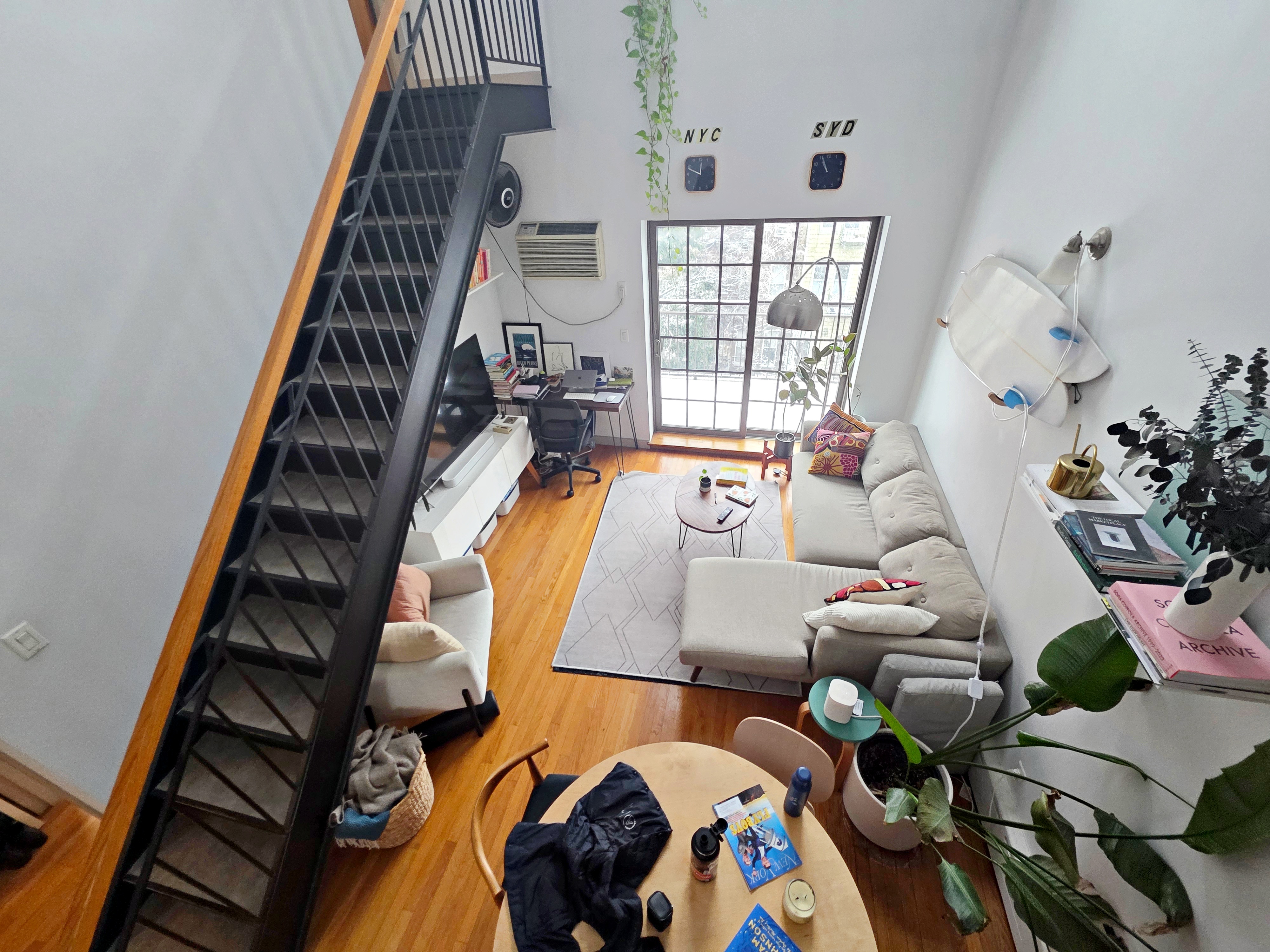 713 Metropolitan Avenue, Unit 4R Brooklyn, NY 11211 - Photo 1 of 11 wooden floor with lots of books on it